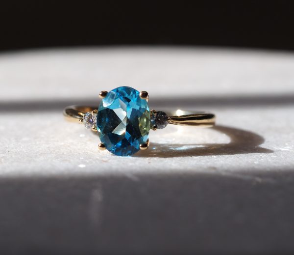Danielle 2.25ct Swiss Blue Topaz Oval & Moissanite Three Stone Ring in 10K solid Yellow Gold